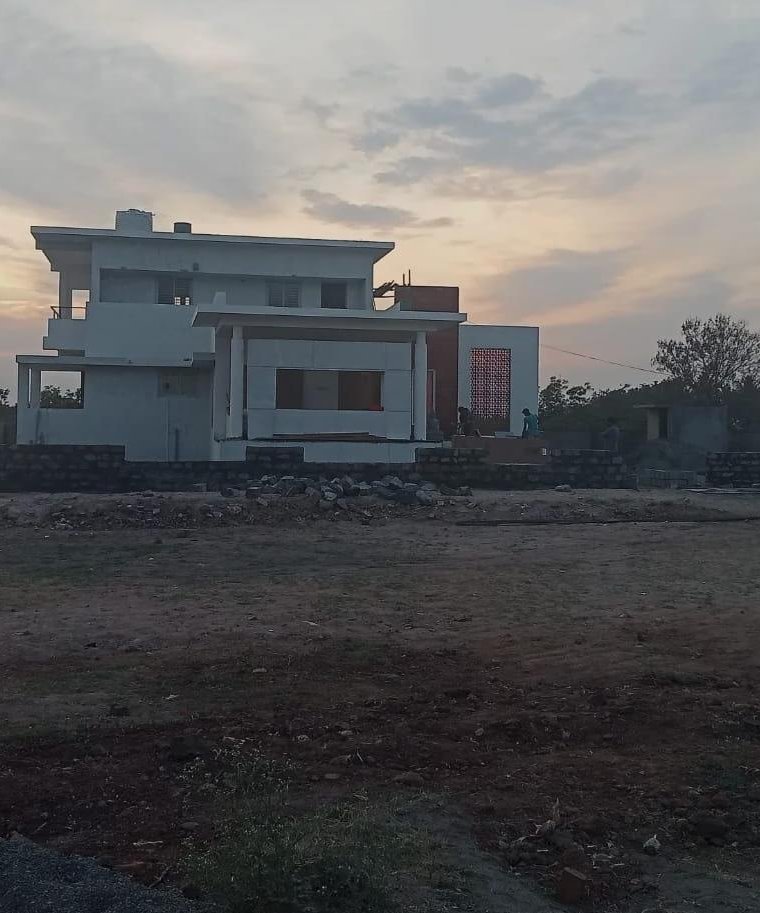 SDR Engineers and Builders construction project at dusk